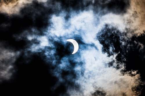 novi quarter moon over clouds moon